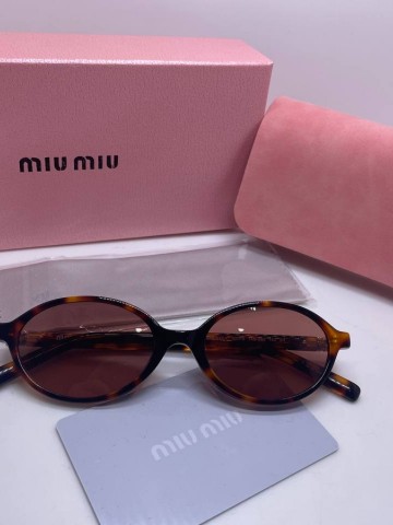Miu Miu очки #557788TI