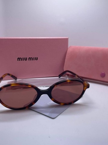 Miu Miu очки #557788TI
